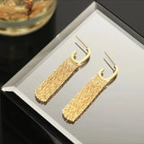 DANGEL EARRINGS